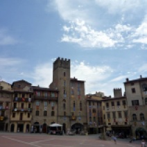 The piazza in Arezzo, Tuscany. Note the numerous coats of arms adorning the buildings surrounding the square. Each represents a specific quarter of the city.